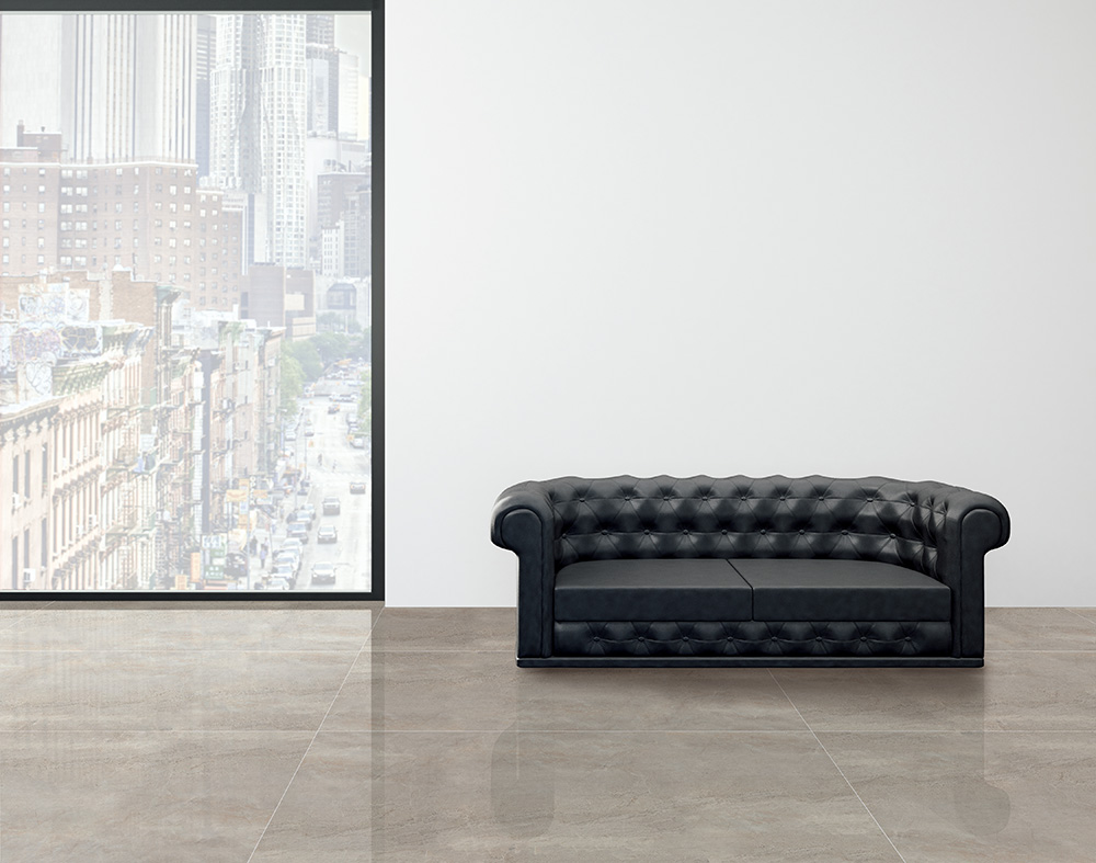 Empty room with white wall, big window with city view and black leather sofa